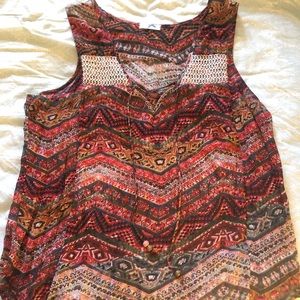 Sheer patterned sleeveless shirt